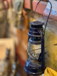 Close-up of lantern on table