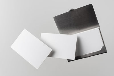 High angle view of paper lamp against white background