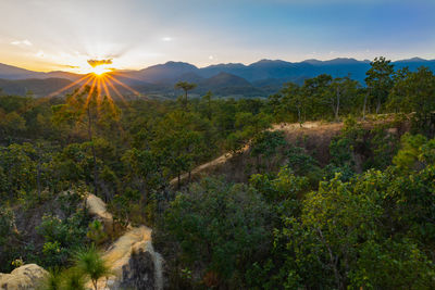 Scenic view of mountains against sky during sunset