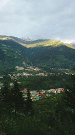 Scenic view of landscape against cloudy sky