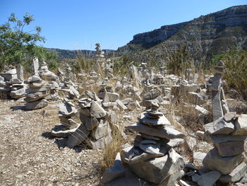 Stack of rocks against clear sky