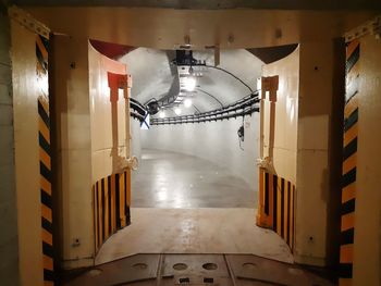 Interior of illuminated subway building