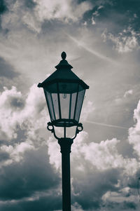 Low angle view of street light against sky