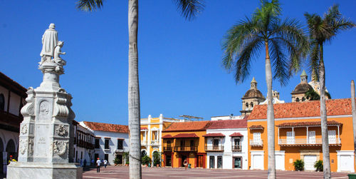 View of buildings against blue sky