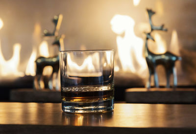 Close-up of beer glass on table