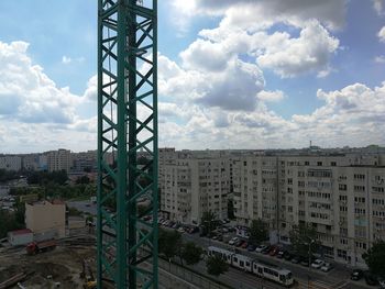 City street and buildings against sky