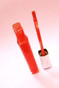 Close-up of red object over white background