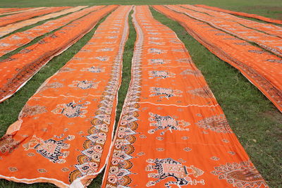 Drying batik cloth in the field