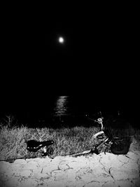 View of illuminated moon against sky at night