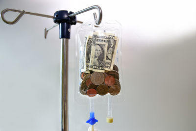 Close-up of electric lamp against white background