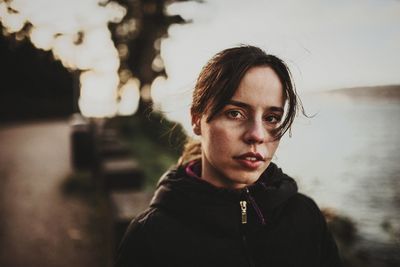 Portrait of woman standing outdoors