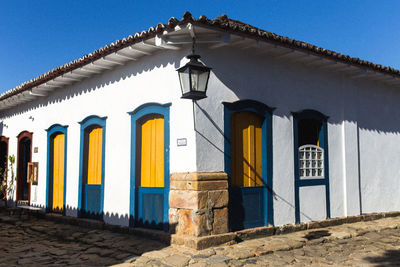 Low angle view of building against blue sky