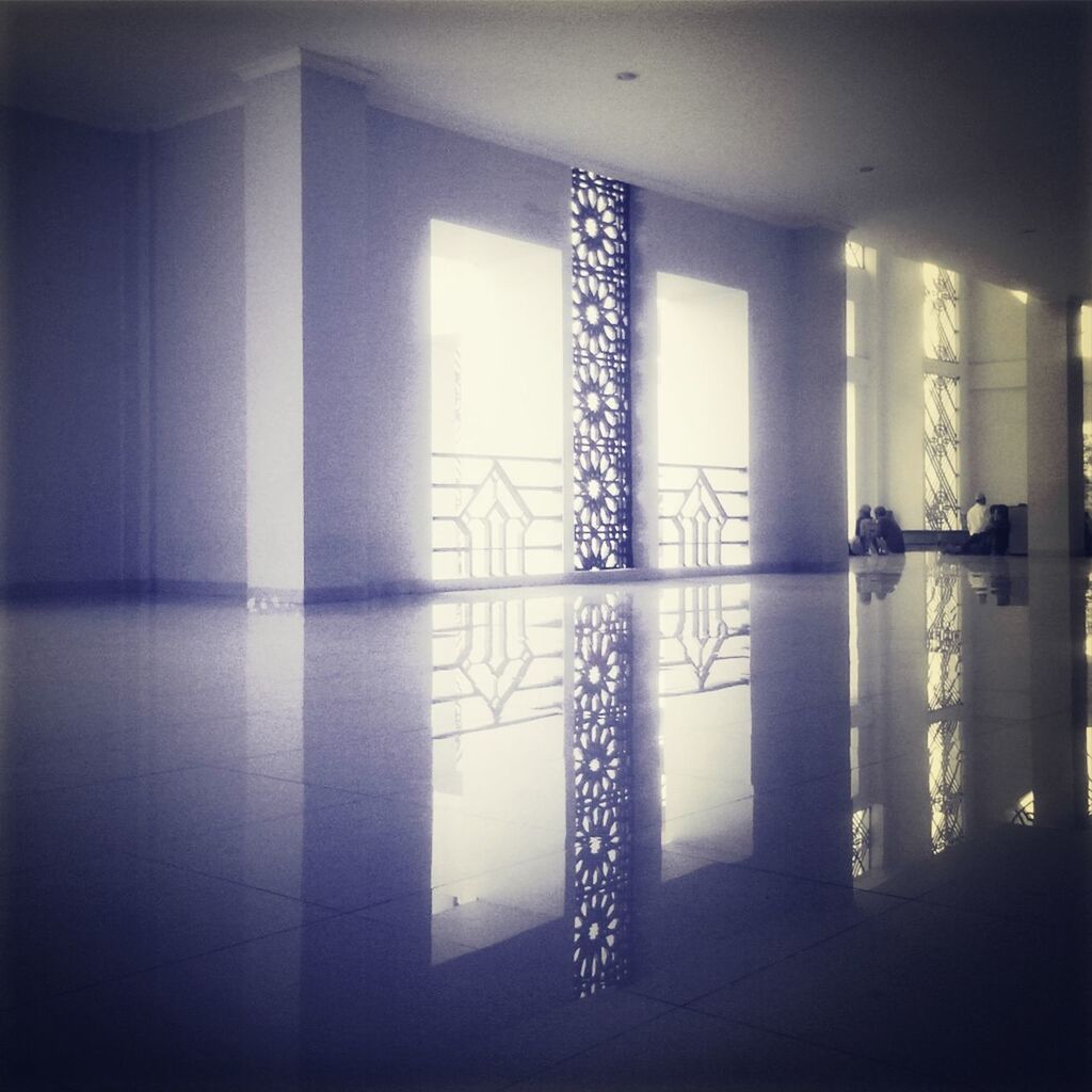 indoors, window, home interior, flooring, built structure, architecture, glass - material, door, absence, empty, transparent, corridor, ceiling, interior, reflection, no people, sunlight, day, tiled floor, closed