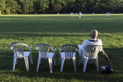 Full length of man playing soccer on field