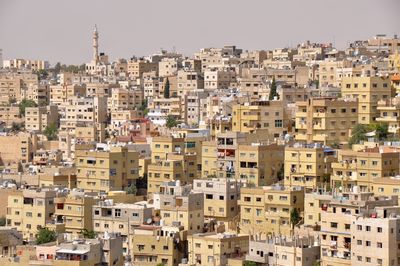 Full frame shot of buildings against clear sky