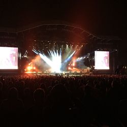 People enjoying music concert