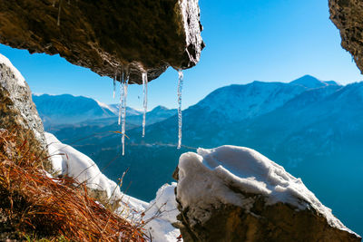 Scenic view of frozen lake against mountains