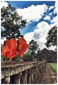 Red temple against sky