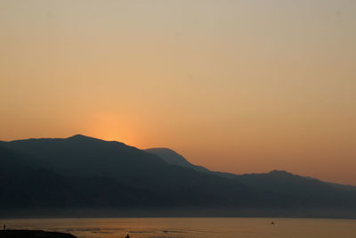 Silhouette of mountain at sunset