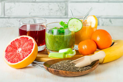 Fruits in glass on table