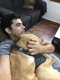 Close-up of man relaxing at home