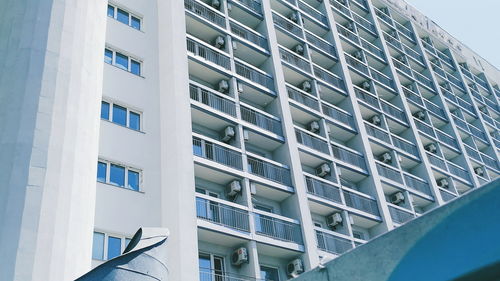 Low angle view of apartment building against sky