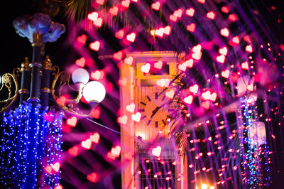 Close-up of illuminated christmas lights at night