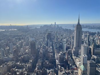 Aerial view of cityscape against sky