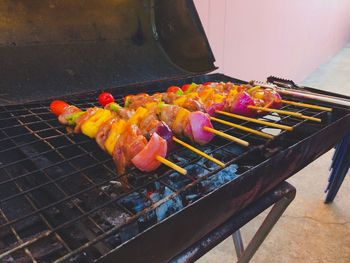 Close-up of meat on barbecue grill