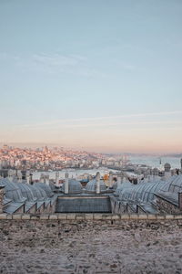 High angle view of buildings against sky during sunset