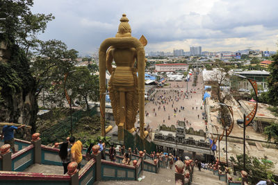 Batu caves entrance and lord murugan statue in kuala lumpur malaysia. 