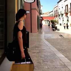 Woman standing in city