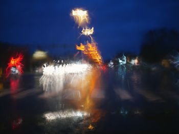 Close-up of firework display at night