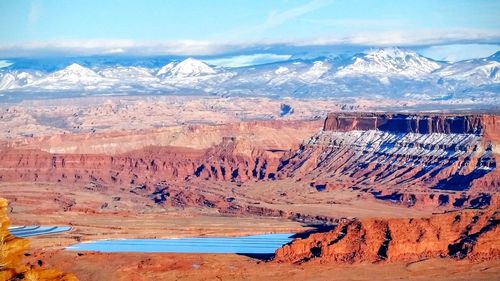 High angle view of landscape with mountain range in background