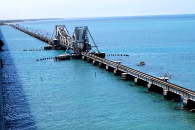 View of pier on sea against sky