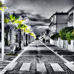 Surface level of built structure against cloudy sky