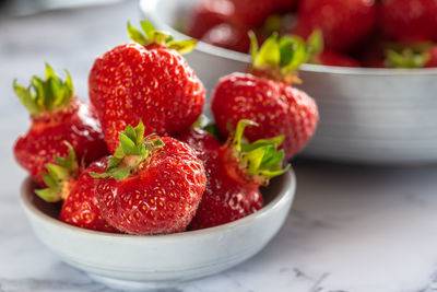 Close-up of strawberries in bowl on table