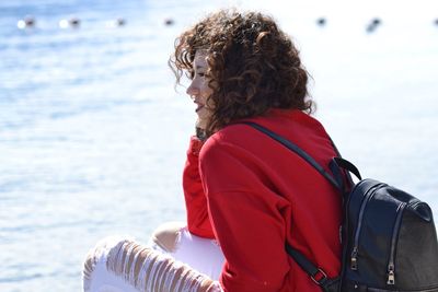 Rear view of woman looking at sea