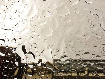 Close-up of water drops on glass