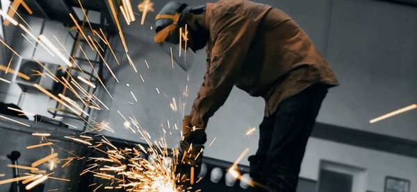 Manual worker working in workshop