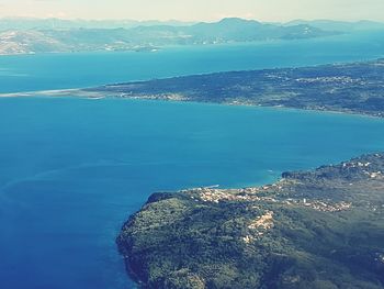 High angle view of lake against blue sky