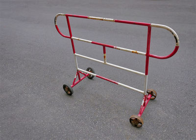 High angle view of metal barrier on street 