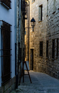 Street light against building