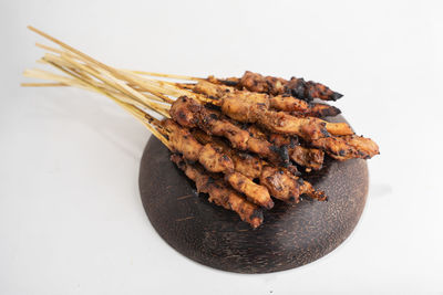 High angle view of meat on white background