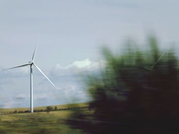 Wind turbines on field