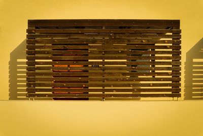 Close-up of yellow stack over white background