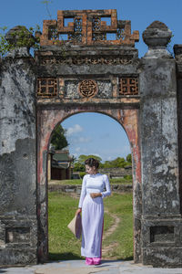 Beautiful woman exploring the imperial palace in hue / vietnam