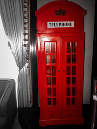 Close-up of red telephone booth