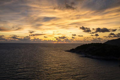 Scenic view of sea against sky at sunset