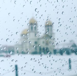 Full frame shot of raindrops on glass window. greek orthodox church 